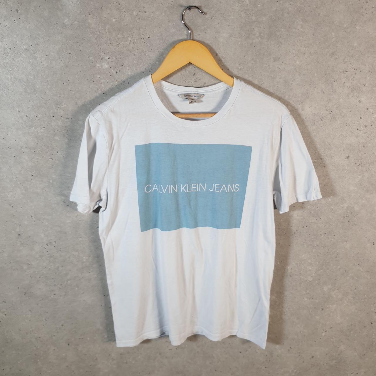 Vintage Calvin Klein Jeans Graphic T Shirt Men’s Medium White Regular Fit Spellout Logo
