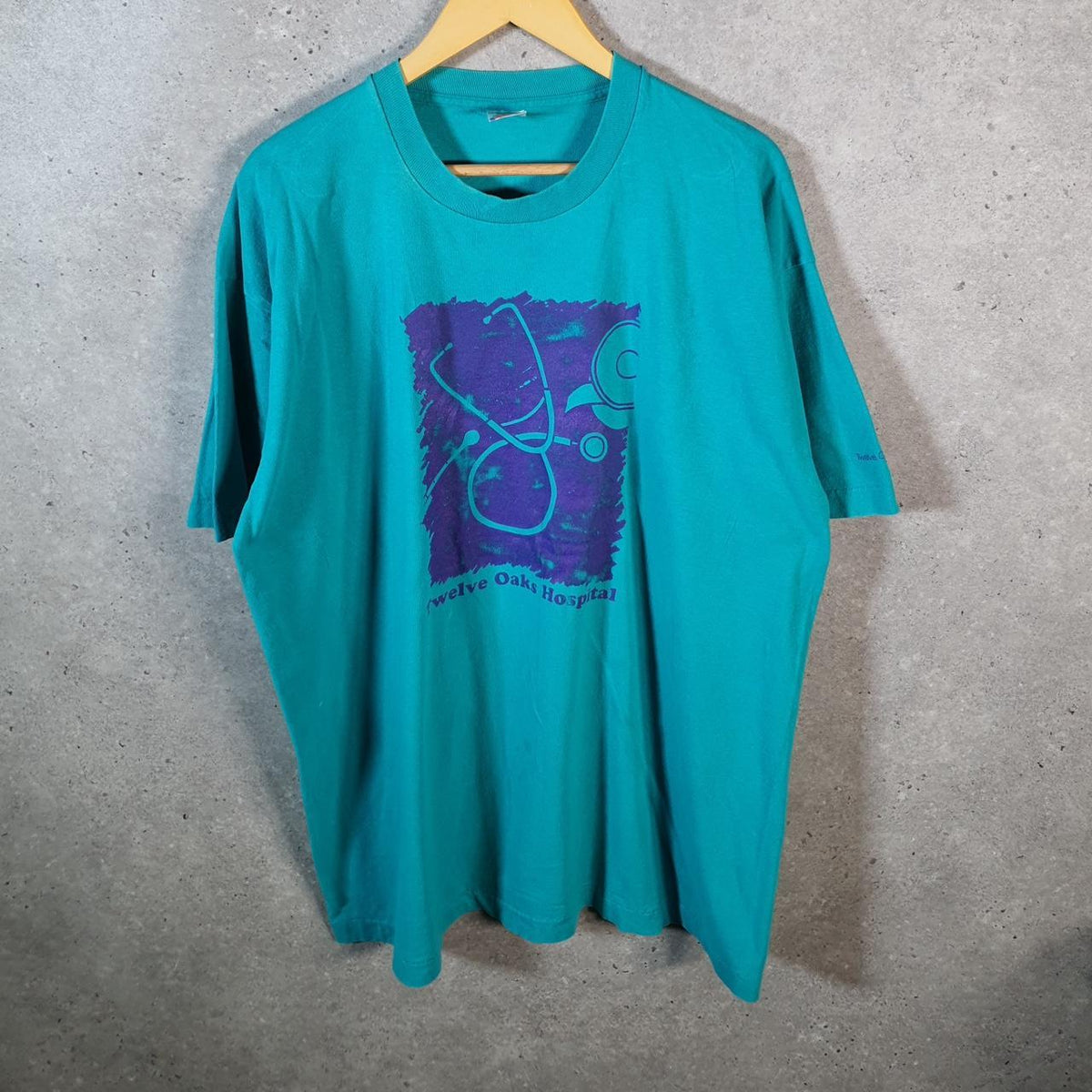Vintage Fruit of the Loom Twelve Oaks Hospital 90s USA Single Stitch T Shirt Men’s 2XL Blue C9655