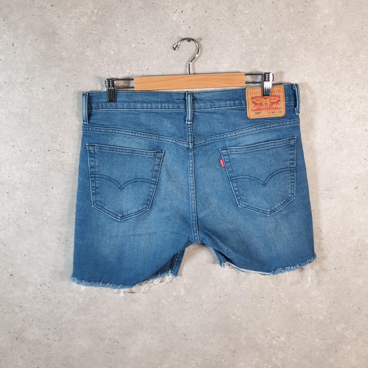 Vintage Levi’s 560 Cut off Shorts Jorts Cargo Men’s W34 Blue Relaxed Denim