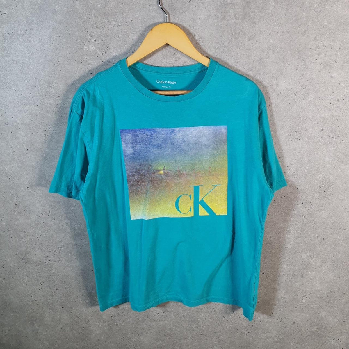 Vintage Calvin Klein Graphic T Shirt Men’s Medium Blue Regular Fit Spellout Logo