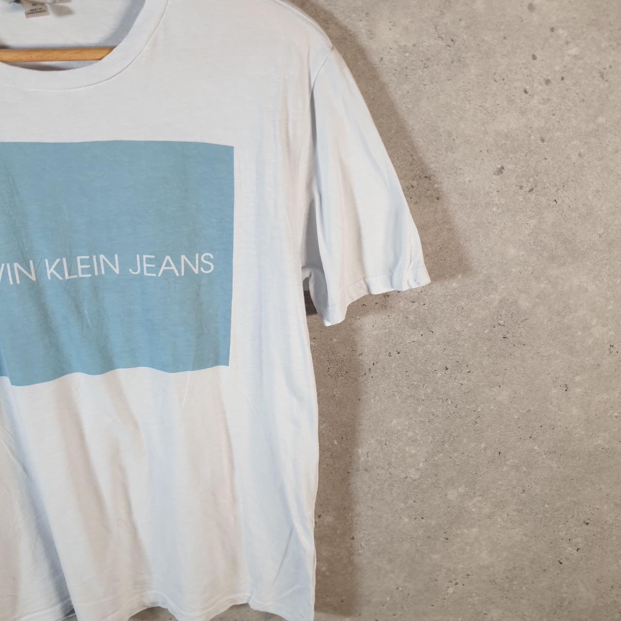 Vintage Calvin Klein Jeans Graphic T Shirt Men’s Medium White Regular Fit Spellout Logo