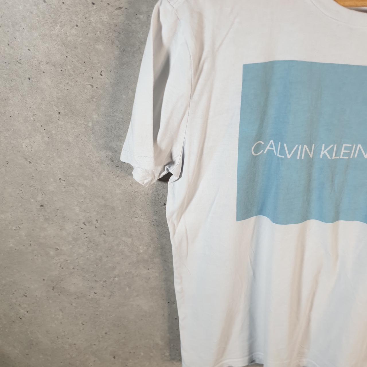 Vintage Calvin Klein Jeans Graphic T Shirt Men’s Medium White Regular Fit Spellout Logo