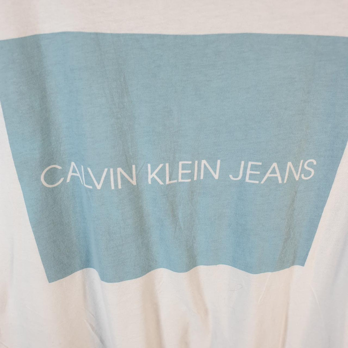 Vintage Calvin Klein Jeans Graphic T Shirt Men’s Medium White Regular Fit Spellout Logo
