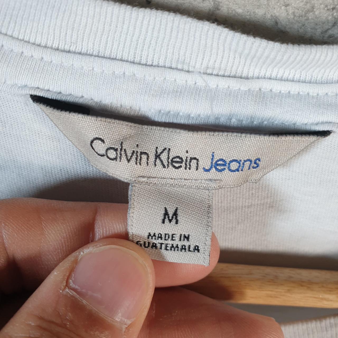 Vintage Calvin Klein Jeans Graphic T Shirt Men’s Medium White Regular Fit Spellout Logo